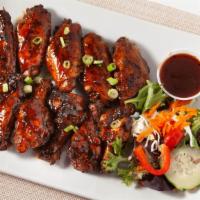Island Wings · Tasty jumbo chicken wings grilled in a special blend of Jamaican spices coated in your choic...