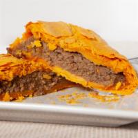 Jamaican Patties · Flaky pocket pastry stuffed with choice of filling. choose from beef, chicken, or veggie (ch...