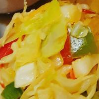Sautéed Cabbage · Fresh cabbage, carrots and bell peppers sauteed to a tender, flavorful treat.