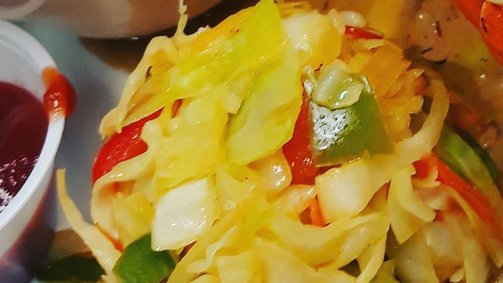 Sautéed Cabbage · Fresh cabbage, carrots and bell peppers sauteed to a tender, flavorful treat.