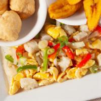 Ackee & Saltfish · Chunks of salted cod and delicate Jamaican ackee sautéed with onions, garlic & peppers.