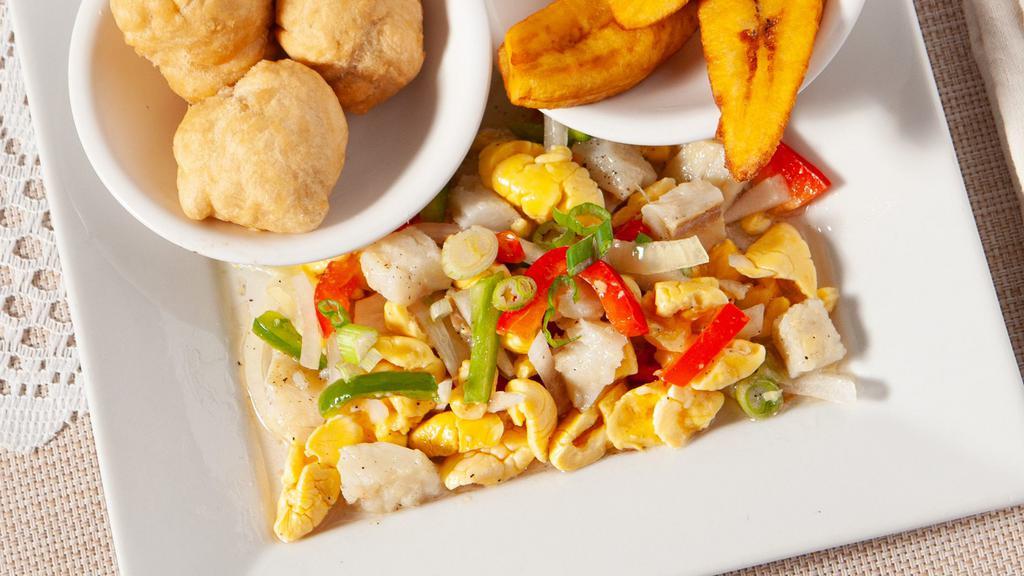 Ackee & Saltfish · Chunks of salted cod and delicate Jamaican ackee sautéed with onions, garlic & peppers.
