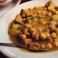 Curry Veggie & Chickpea · Chickpea, carrots, cauliflower, potatoes, onions, peppers & broccoli simmered in a house-ble...