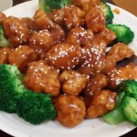 Sesame Chicken · Served with fried rice egg roll & soup.
