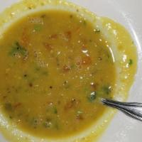 Dal Soup · Traditional lentil soup prepared with mild Indian herbs and spices and diced tomatoes. Veget...