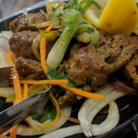 Seekh Kabob · Your choice of ground chicken or lamb spiced up with mint and garam masala baked on a skewer...