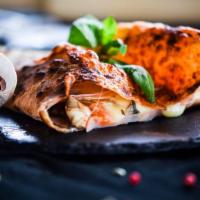 The Bacon & Ham Calzone · Meat classic bacon strips cut and ham slices mixed with ricotta cheese wrapped in a calzone ...