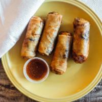 Spring Rolls (4) · Deep fried wonton wrappers stuffed with cabbage, carrots, mushrooms and bean thread. Served ...