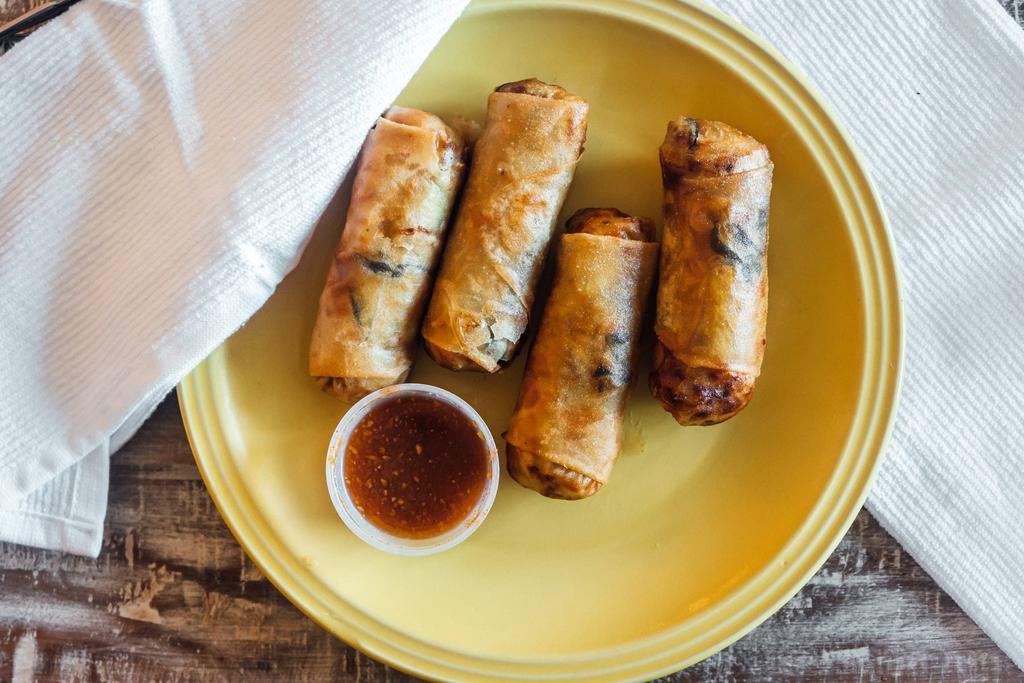 Spring Rolls (4) · Deep fried wonton wrappers stuffed with cabbage, carrots, mushrooms and bean thread. Served with sweet and sour sauce.