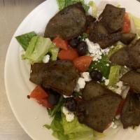 Gyro Salad · Romaine, gyro meat, feta cheese, Kalamata olives, sliced tomatoes and cucumbers.