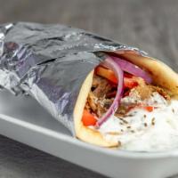 Gyros Wrap  · Lamb & beef thinly sliced gyro wrapped in a warm pita along with lettuce, tomatoes, onions a...