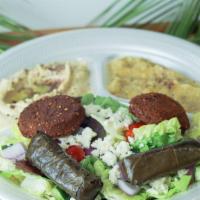 Palms Veggie Plate · Baba ghanoush hummus 2 pieces of dolma and 2 pieces of falafel served with pita bread and sa...