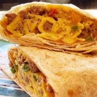 Breakfast Burrito · Flour tortilla with eggs, bell peppers, onions, Italian sausage, breakfast sausage, tomatoes...