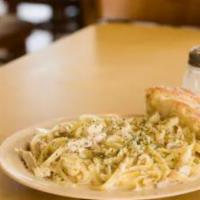 Pasta Alfredo With Chicken · Fettuccine noodles in our creamy Alfredo sauce with grilled chicken. Served with 1 piece gar...