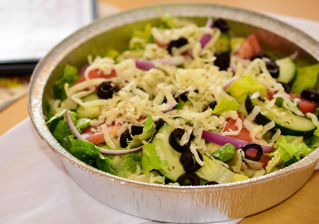 Garden Salad · Romain lettuce, cucumbers, tomatoes, black olives, red onions, mozzarella cheese. Served with your choice of dressing