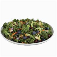 Kale Superfood Salad · Kale, blueberries, green cabbage, carrots, dried cranberries, roasted sunflower seeds, red o...