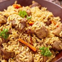 Beef Fried Rice · Tender beef pieces mixed with seasonal veggies including carrots, peas, scallions and garlic...