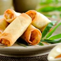 Chicken Egg Roll (1 Piece) · Crispy wonton roll stuffed with ground chicken, garlic, ginger, cabbage and carrots. Fried u...