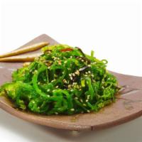 Seaweed Salad · Perfectly cut seaweed marinated in a light soy, sesame and rice vinegar dressing.