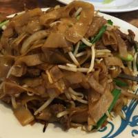 Beef Chow Fun · Tender beef, onions and bean sprouts sauteed with flat white noodles.