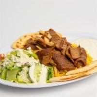 Gyro Plate · Seasoned thin sliced Lamb and beef served with tzatziki sauce, Rice, Greek salad and Pita br...