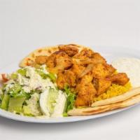 Chicken  Plate · Tender marinated chicken breast served with tzatziki sauce , Rice, Greek salad and Pita bread.