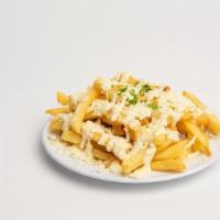 Greek Fries · French fries covered with rich garlic sauce and feta cheese.