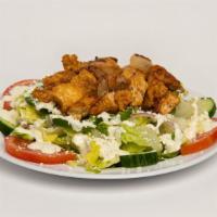 Chicken Salad · Marinated tender chicken over a Greek salad.