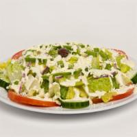 Greek Salad · Fresh romaine lettuce, tomatoes, olives ,cucumbers and onions  topped with garlic sauce and ...