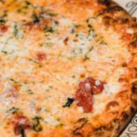 Margherita Pizza · San Marzano Tomato, Fresh Mozzarella, Basil