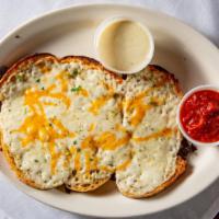 Cheesy Garlic Bread · Served with alfredo and marinara sauce