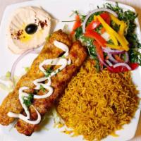 Chicken Kabab · two skewers of chicken kabab & rice&salad plate.