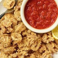 Calamari · Hand-breaded to order and served with our Ricardo and marinara sauces.