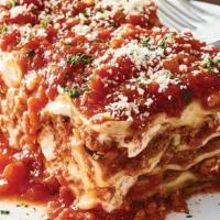 Lasagne · Fresh pasta layered with our pomodoro sauce, meat sauce, ricotta, romano and mozzarella chee...