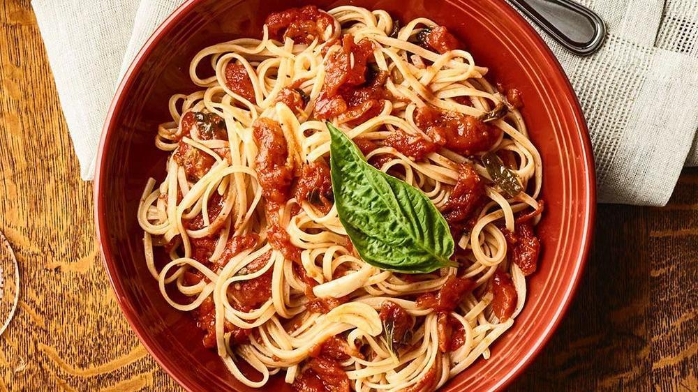 Linguine Positano · Crushed tomatoes, garlic, olive oil and basil.