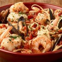 Linguine Pescatore · Shrimp, scallops and mussels tossed in our spicy marinara sauce with linguine imported from ...