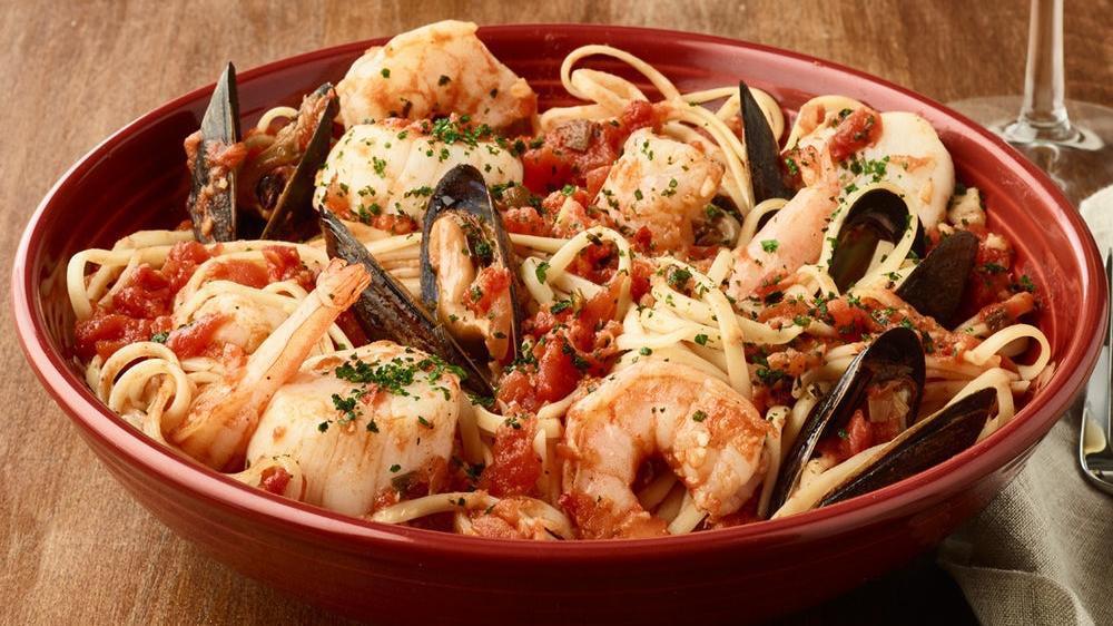 Linguine Pescatore · Shrimp, scallops and mussels tossed in our spicy marinara sauce with linguine imported from Italy