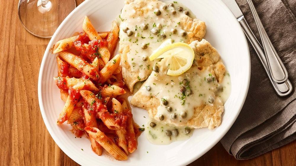 Chicken Piccata · Thin, tender cutlets of chicken lightly dusted with flour, sautéed and topped with lemon butter sauce, parsley and capers