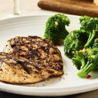 Tuscan-Grilled Chicken · Wood-grilled and seasoned with our signature grill baste, olive oil and herbs. Served with y...