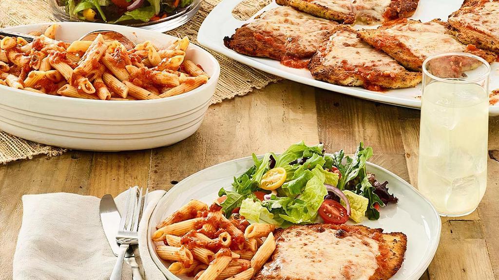 Family Bundle Chicken Parmesan · Coated with Mama Mandola’s breadcrumbs, sautéed and topped with our pomodoro sauce, romano and mozzarella. Served with choice of penne pomodoro, garlic mashed potatoes, or sauteed broccoli. Includes your choice of side salad and bread. Feeds 4-5.
