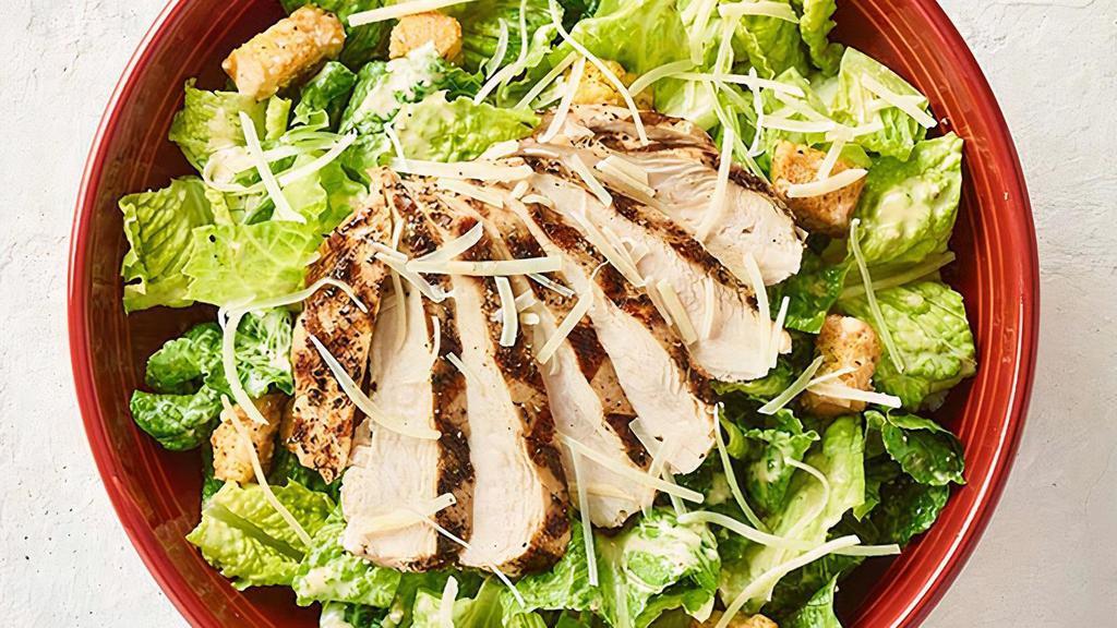 Caesar Salad · Large, fresh romaine, croutons and parmesan cheese served with a side of our caesar dressing