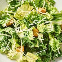 Side Caesar Salad · Fresh Romaine, croutons and parmesan cheese served with a side of our caesar dressing