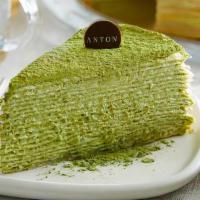 Matcha Mille-Crepe Cake · Lacy thin crepes and our light pastry cream accented with Matcha green tea flavor.