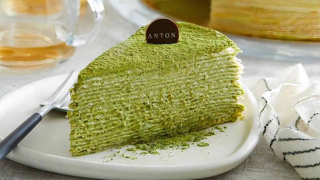 Matcha Mille-Crepe Cake · Lacy thin crepes and our light pastry cream accented with Matcha green tea flavor.