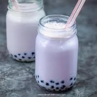 Taro Milk Tea · Taro Milk Tea is our best seller drink.  This is must try 👋