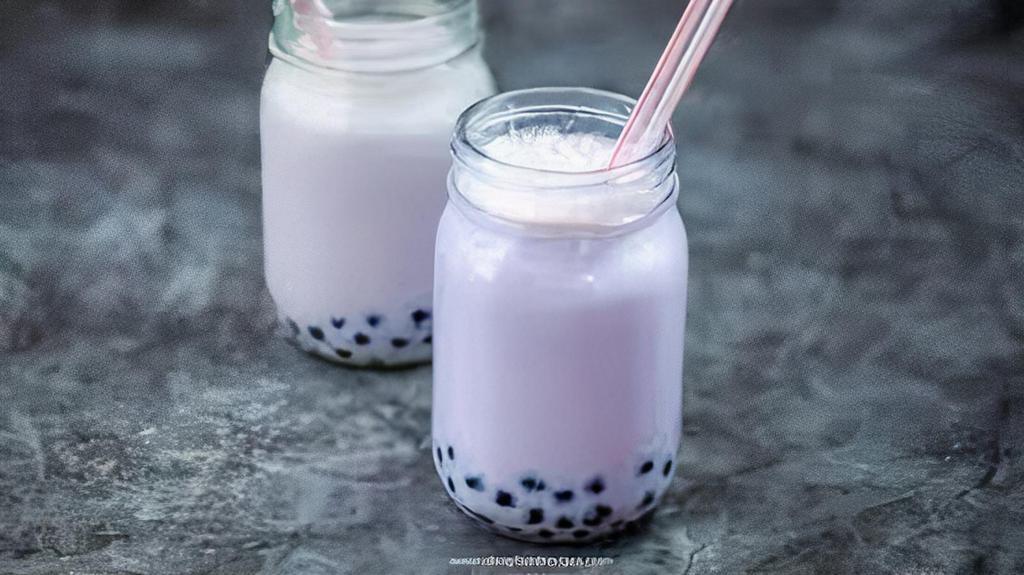 Taro Milk Tea · Taro Milk Tea is our best seller drink.  This is must try 👋