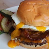 Old Fashioned Burger * · Brioche Bun / Applewood Smoked Bacon / Aged Cheddar / Sauteed Onion / Sliced Tomato / Egg Yo...