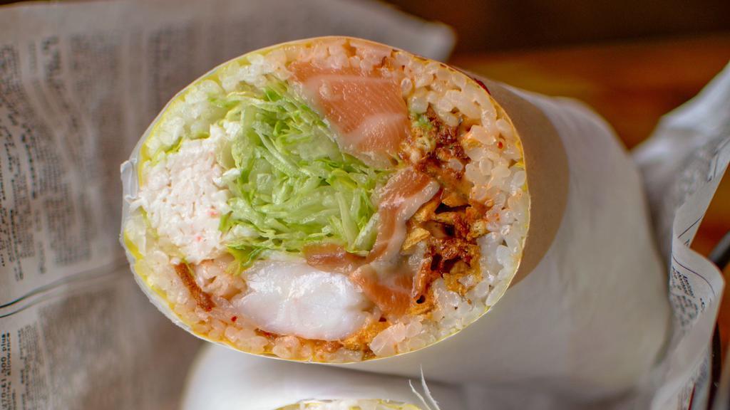 Tcm Sushi Burrito* · Sushi rice, shrimp, salmon, crab salad, avocado, lettuce, potato, soy crepe, spicy mayo, kimchi sauce.