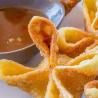 Cream Cheese Rangoon (3) · Tasty appetizer, made with creamy and crunchy wontons.