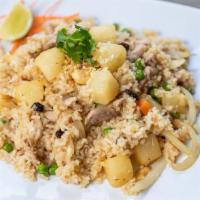 Pineapple Fried Rice · Rice Flavored Fried Rice with cashews, raisins and pineapple.